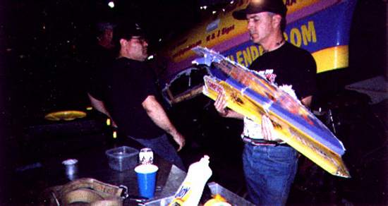 Blake and Lyle inspect the piece that blew off the body.